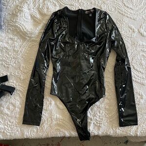 Dolls Kill TOTAL DOMINANCE PVC BODYSUIT
TRICKZ N' TREATZ